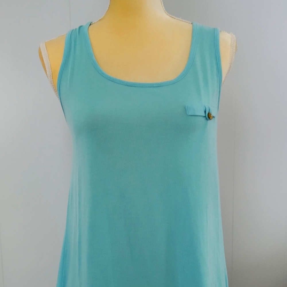 Sleeveless Turquoise Knit Top with cutout detail